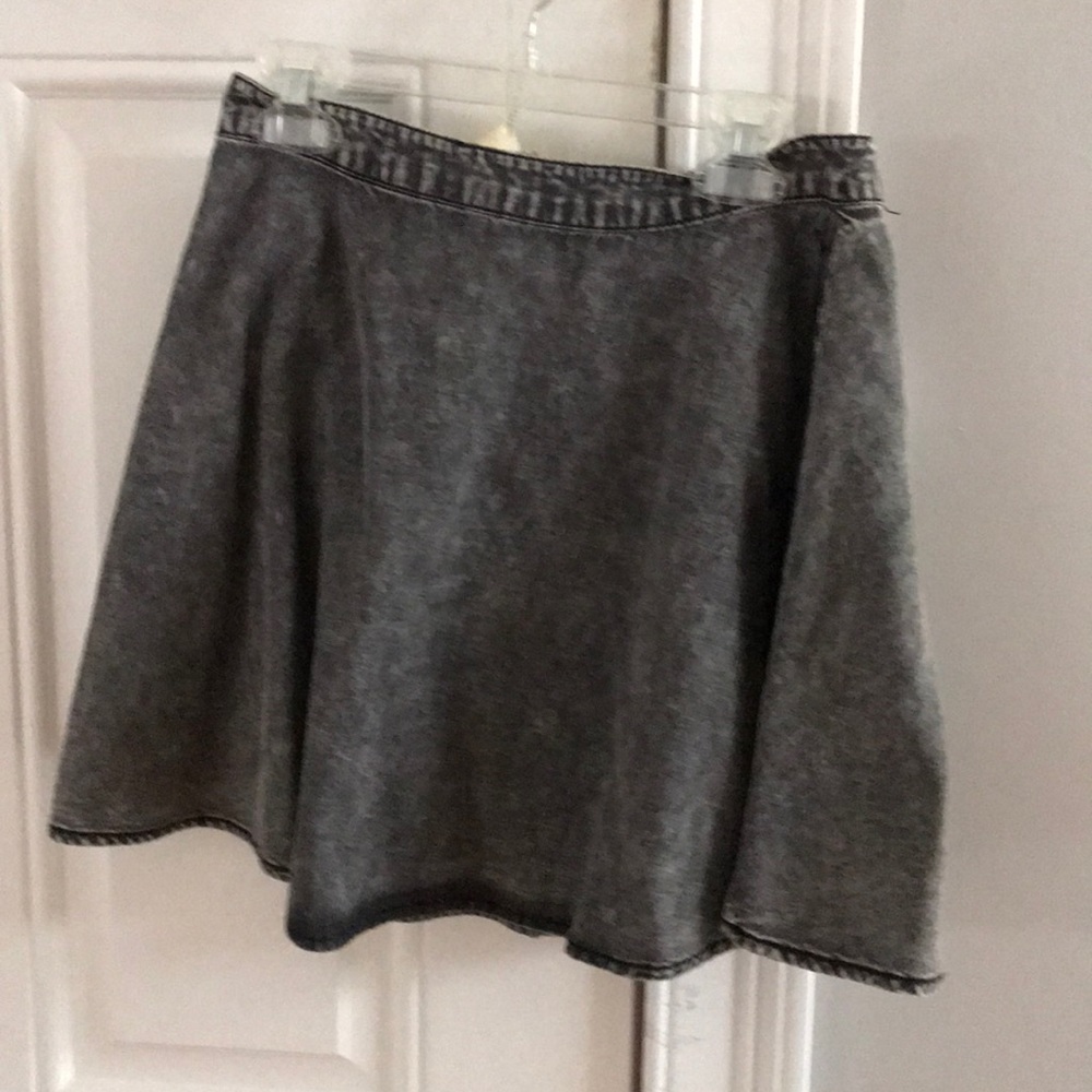 An unworn unique finish skirt.